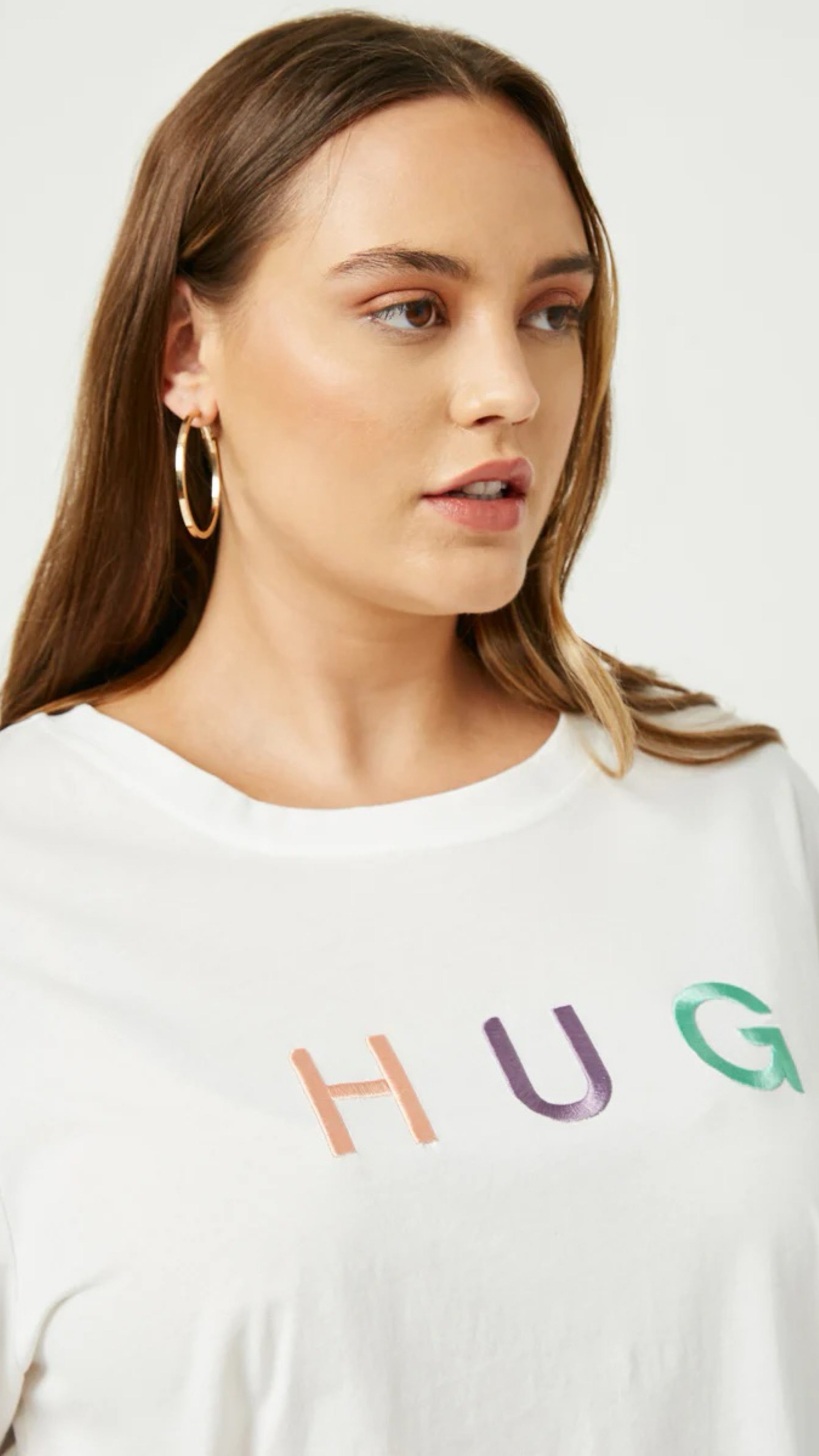 061025 Ivory Short Sleeve HUG Design Graphic Top