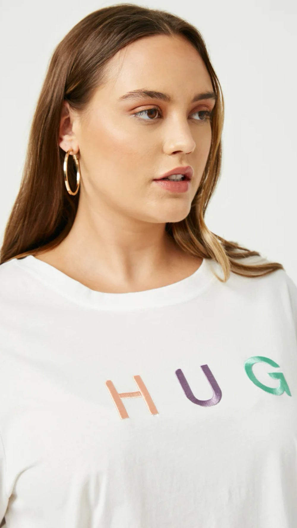 061025 Ivory Short Sleeve HUG Design Graphic Top