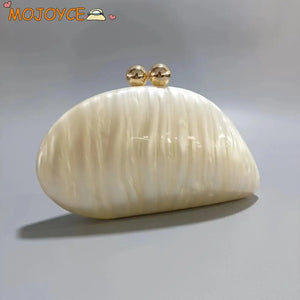 08272024 Ivory & Pearl Seashell Clutch